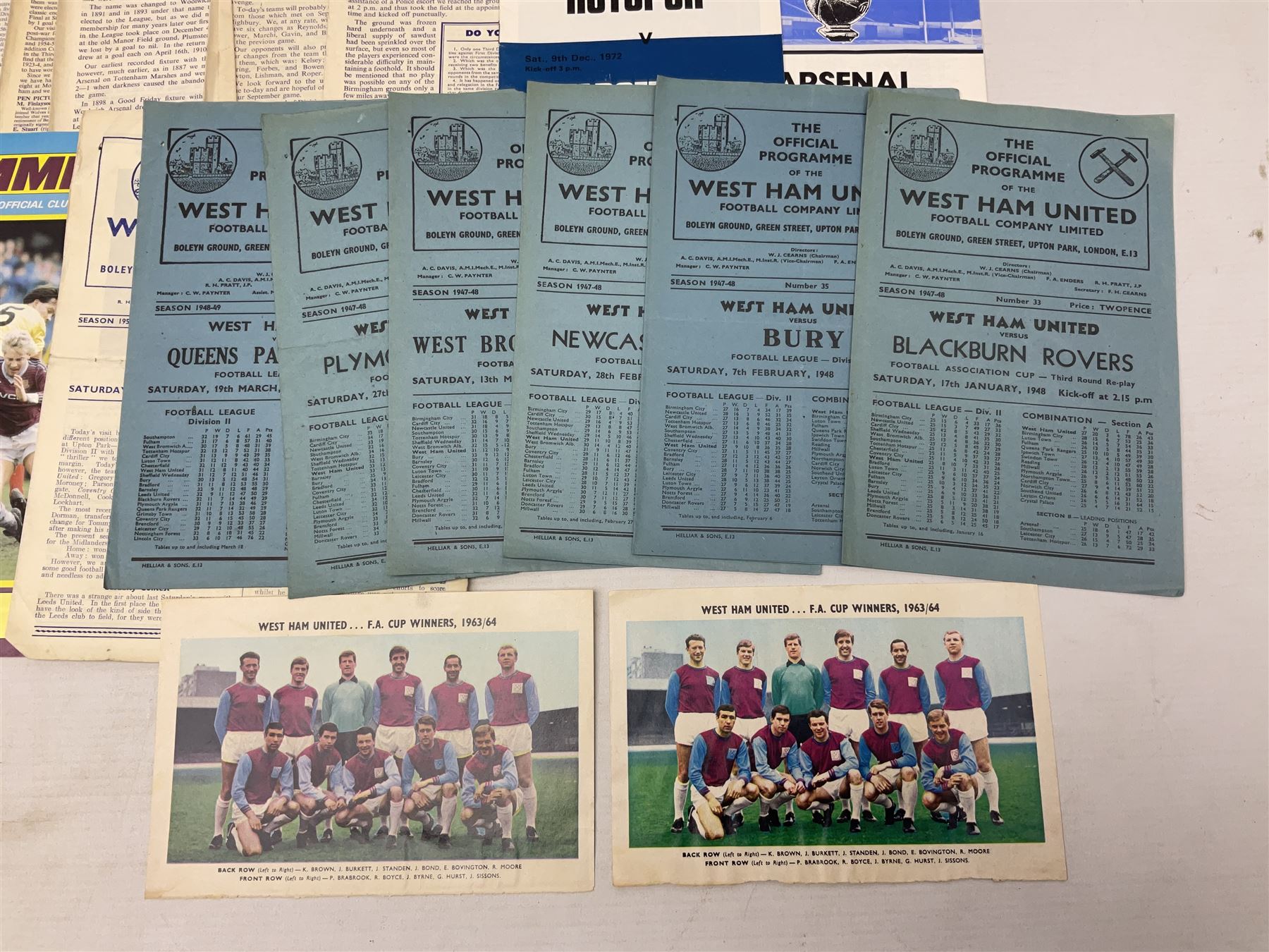 West Ham United - eight 1940s/50s home programmes for 1947/48 - 1951/52 and another for 1986/87 and two team photographs; together with eight Tottenham Hotspur home programmes 1952/53 - 1976/77 (17)