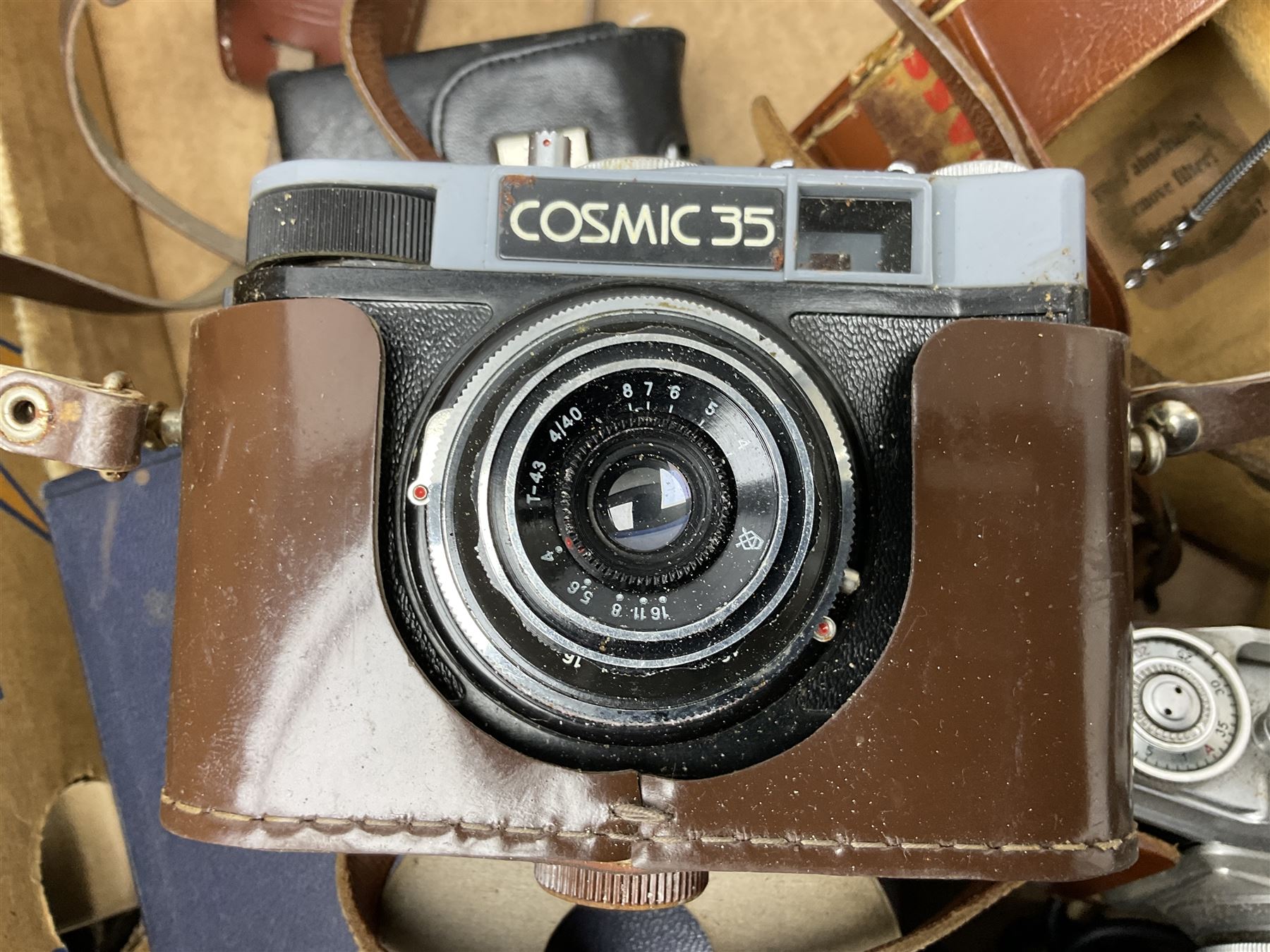 Collection of camera and equipment, to include Canon PowerShot S500, Cosmic 35, polaroid 320, etc, in two boxes  