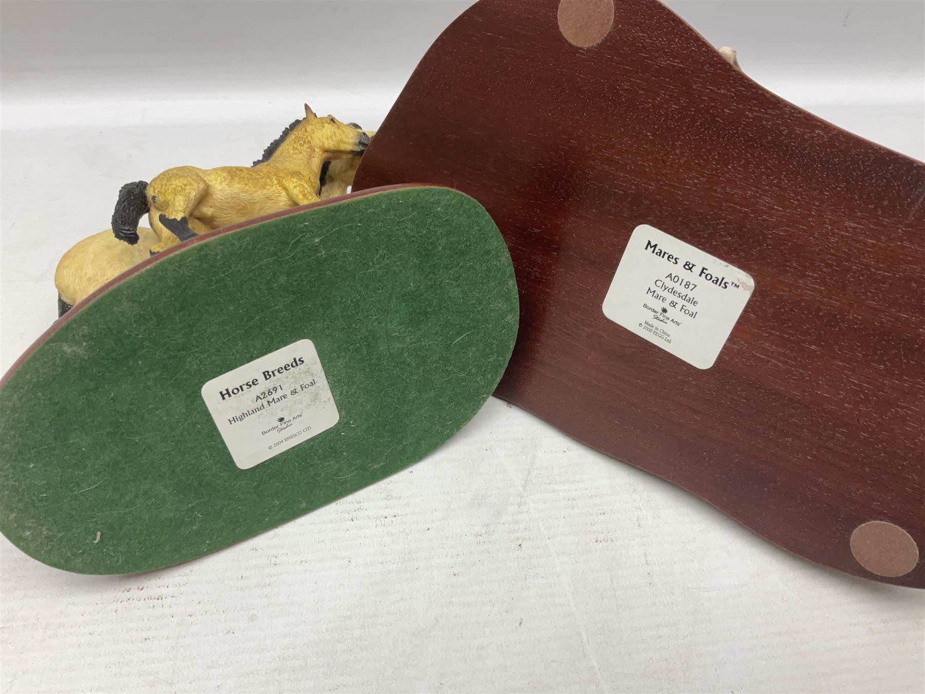 Seven Border Fine Arts figures, comprising Clydesdale Mare & Foal A0187, Highland Mare & Foal A2691 and five horses from the Action Horses series 