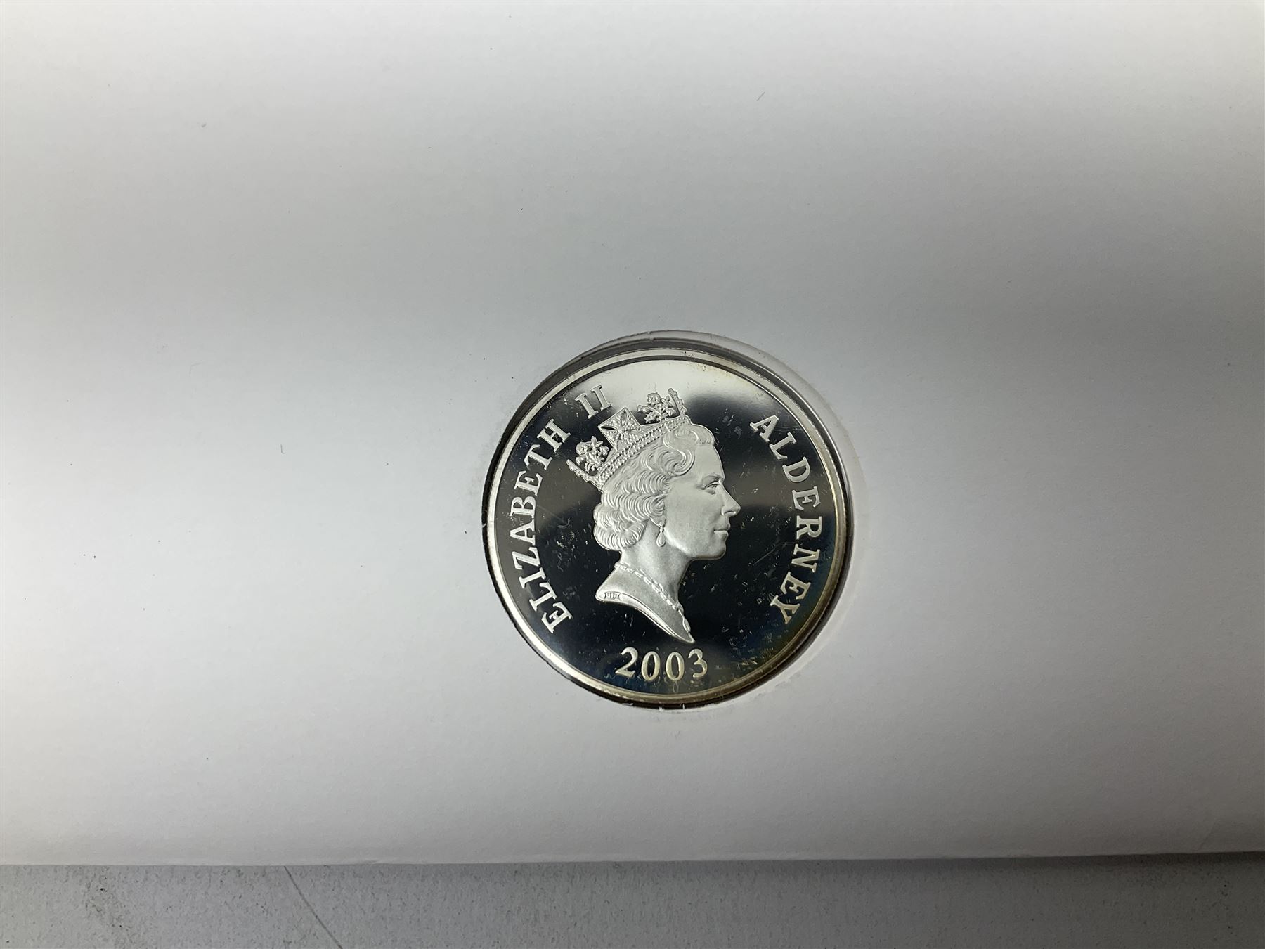 Eight coin covers including, 'Her Majesty Queen Elizabeth II 70th Birthday' containing a 1996 Canadian one ounce silver coin, three coin covers commemorating the 21st Birthday of HRH Prince William each containing a silver coin, '1895 1952 A Tribute to HM King George VI' containing a South Africa 1952 five shilling coin, 'The Notting Hill Carnival' containing a 1998 fifty pence etc (8)