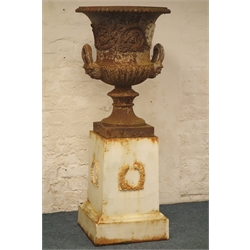  Large cast iron urn, gadrooned top and scroll body with lions mask handles, on wreath cast tapering square pedestal, H140cm, W59cm  