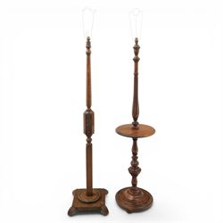 Late Victorian set of two oak standard lamps, turned and carved column supports, one with ...