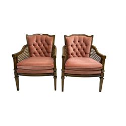 Pair stained beech framed bergere armchairs, upholstered in buttoned pink fabric
