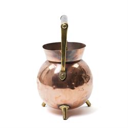 Copper teapot designed by Dr Christopher Dresser for Benham & Froud of bulbous form with brass and wood handle and three spur feet, impressed mark H24cm 