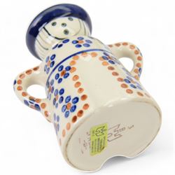 Collection of Ceramika Artystyczna Boleslawiec ceramics and similar Polish ceramics, including cheese dome in the form of a lady, chopping board, fruit bowl and figural candlestick