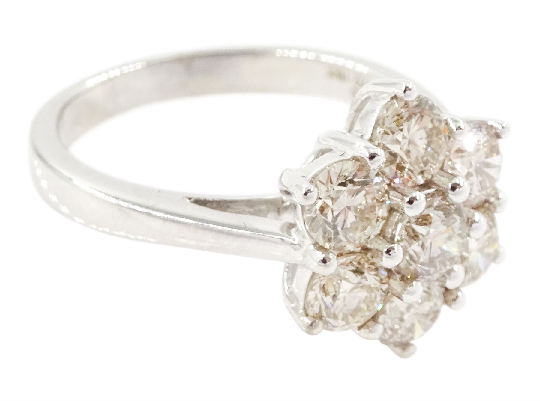18ct white gold diamond daisy cluster ring, set with seven round brilliant cut diamonds, stamped 750, total diamond weight 2.16 carat, with World Gemological Institute report