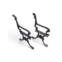 Carron Foundry - two pairs of 19th century cast iron garden bench ends, ornate detail with arms and X shaped legs,finish in black paint, the design no. 110396, first registered 13 July 1857 (see illustration), width as desired