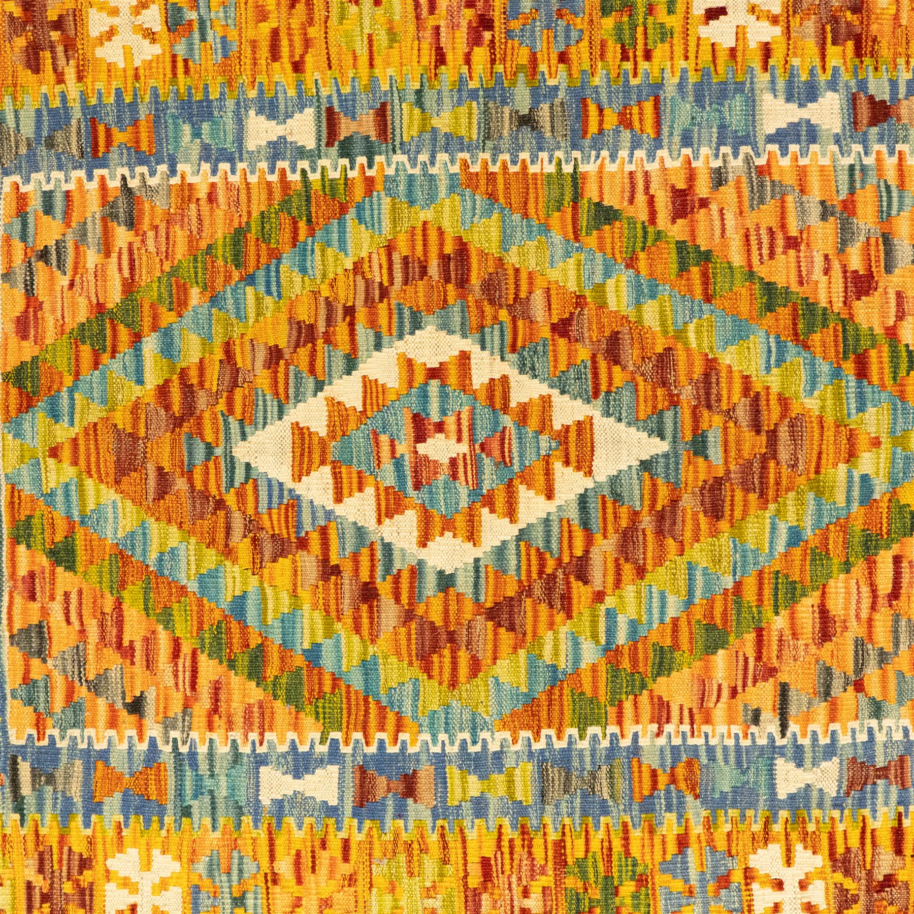Two Chobi Kilim flatweave rugs, comprising the largest kilim on a cream ground with a grid of stepped diamond medallions in a palette of rust red, turquoise, green, ochre, and lilac,, filled lozenge motifs, framed by a cream ground border, 148x101cm, Chobi Kilim with multi-stepped diamond medallion with serrated bands, in terracotta, turquoise, green, saffron and blue, framed by a broad polychromed border of stylized guls and narrow guard stripes, 114x87cm 