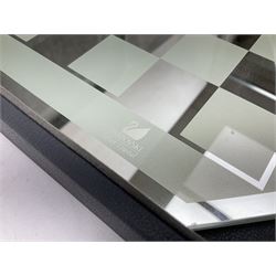 Swarovski silver crystal cut glass chess set, with clear and black pieces on mirrored board, in original presentation box 