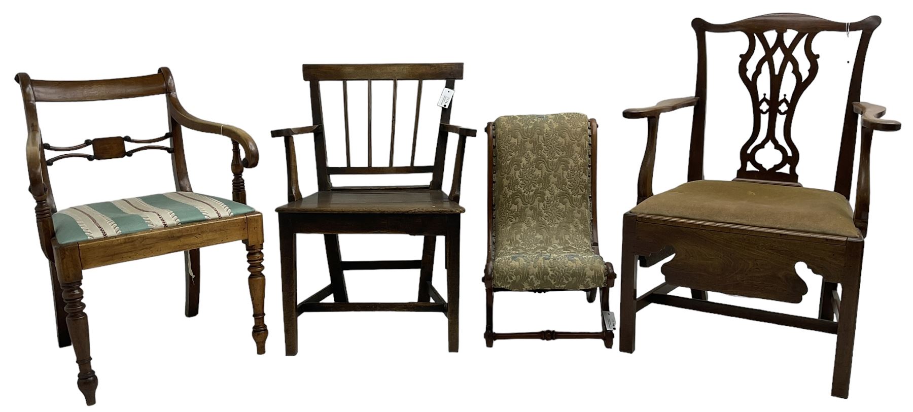 George III walnut elbow chair, bar back over upholstered drop-in seat, scrolled down sweeping arms, on turned front supports (W59cm, H84cm); George III mahogany commode elbow chair, shaped cresting rail over pierced Gothic splat, hinged seat revealing commode, on moulded square supports united by H-shaped stretchers; 19th century country elm elbow chair, rectangular bar back over vertical moulded rails,  plank seat, on square tapering supports united by H-shaped stretchers; Victorian mahogany child's chair, S-scroll form upholstered in foliate pattern fabric (4)