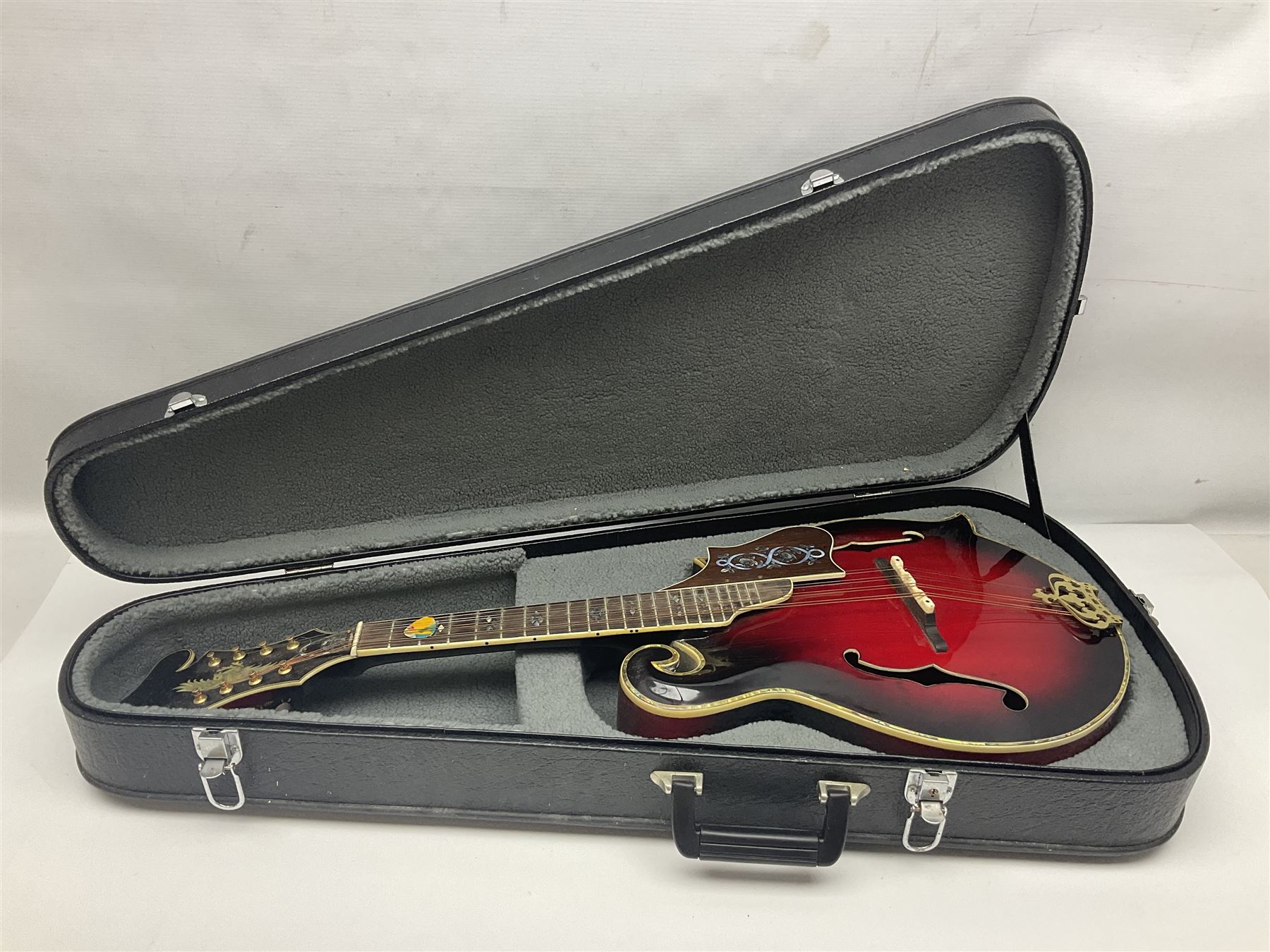 Eastern eight-string mandolin with red sunburst finish and mother-of-pearl inlay of eagles, clouds, trees etc L86cm; in fitted hard carrying case