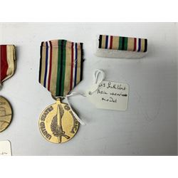 Nine American medals including WW2 Navy and Army Occupation medals, 1939-41 Defence Medal, boxed National Defence Medal and bar, South West Asia Service with bar, Air Force, National Guard and Military achievement medals etc (9)