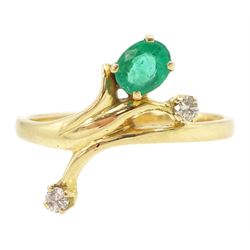 Gold three stone oval cut emerald and round brilliant cut diamond ring