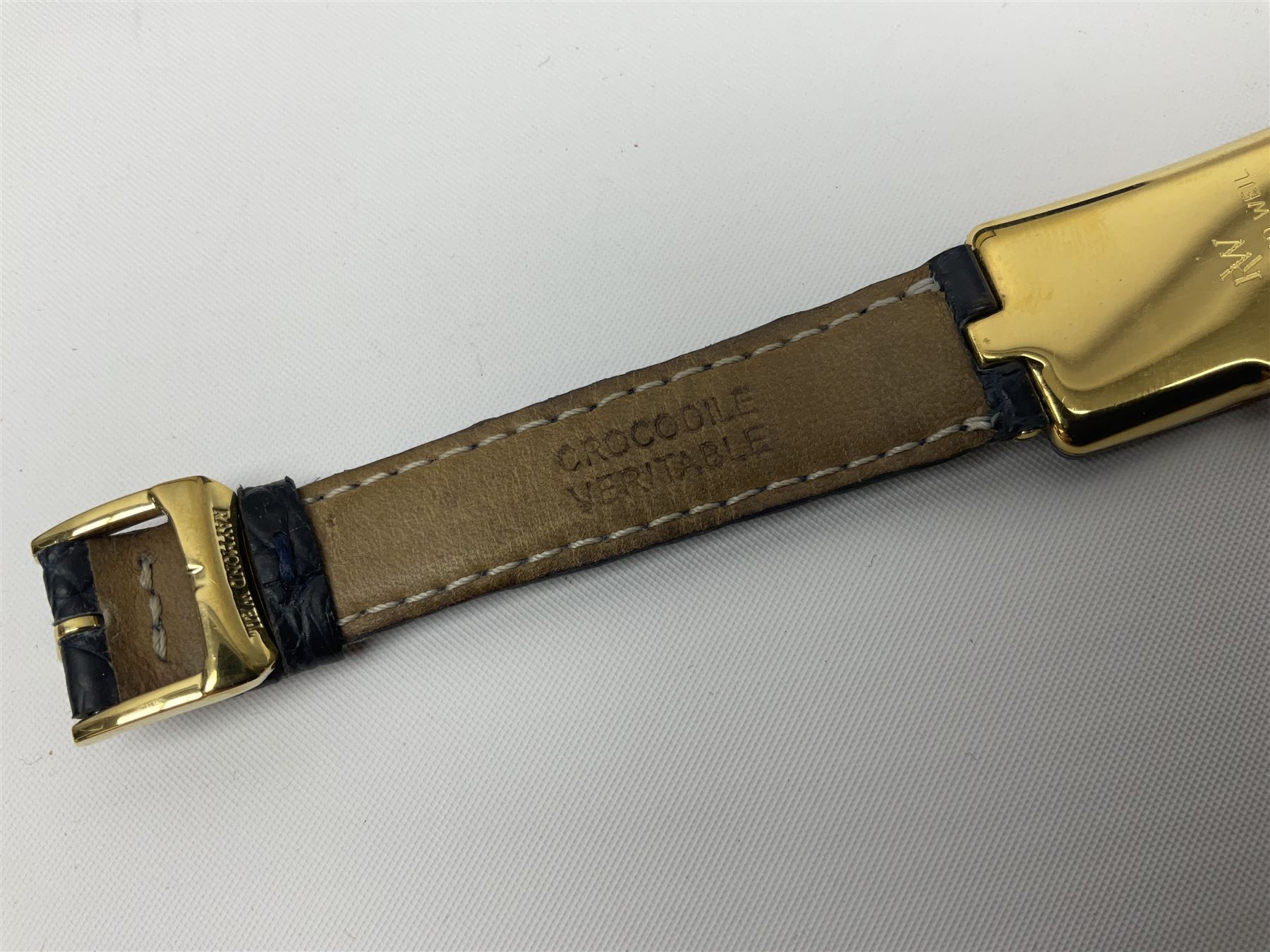 Raymond Weil ladies 'Othello' wristwatch, the rectangular 18ct gold plated case with blue enamel dial, on a Raymond Veil navy blue crocodile leather strap, in original box