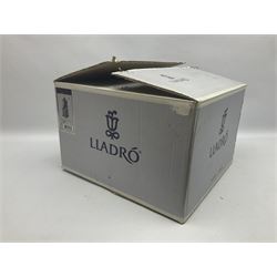 Lladro figure, Justice, modelled as a judge sat in a char, sculpted by Salvador Furió, with original box, no 5489, year issued 1988, year retired 1993, H34cm 