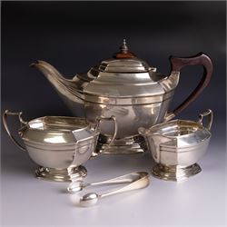 Art Deco three-piece silver tea service, comprising teapot with removable tea strainer, op...