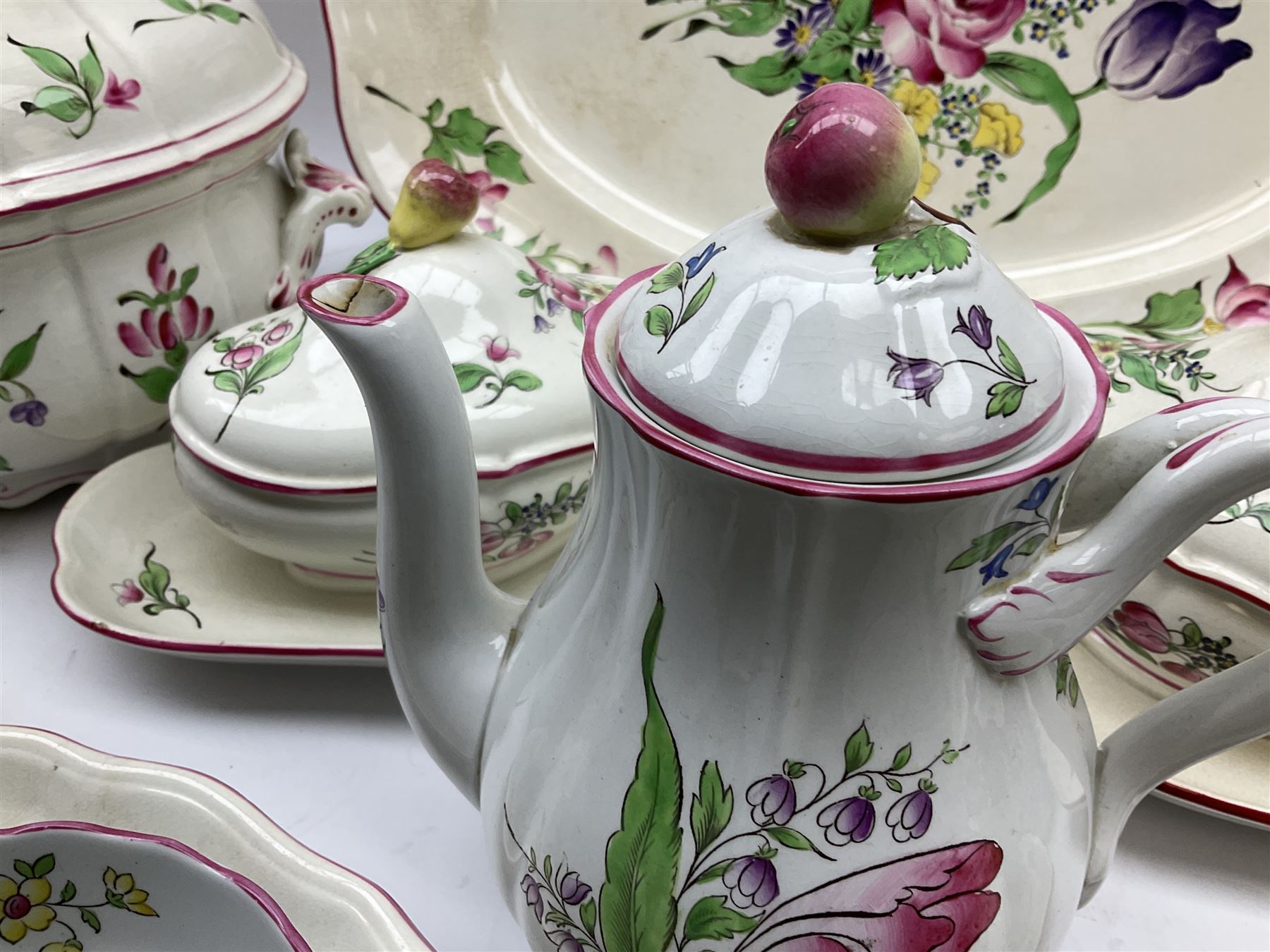 Matched Copeland Spode, Spode and French Luneville and Marlborough Sprays pattern dinner and tea wares, comprising two tureen and covers and apple finials, two sauce tureen and covers with pear finials and fixed stands, six graduated platters including two pairs, large plate, thirteen dinner plates, twelve bowls, ten smaller bowls, eight side plates, eleven smaller side plates, teapot, twin handled sucrier and cover with apple finial, open sucrier, cream jug, smaller cream jug, four breakfast cups, eight tea cups, four large saucers, eleven smaller saucers, and nine further smaller saucers. 