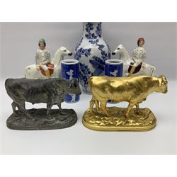 Pair of Staffordshire flat back jockeys on horseback, Chinese blue and white ceramics, two composite bull figures, three Chinese carved soapstone animals and other ceramics, in one box