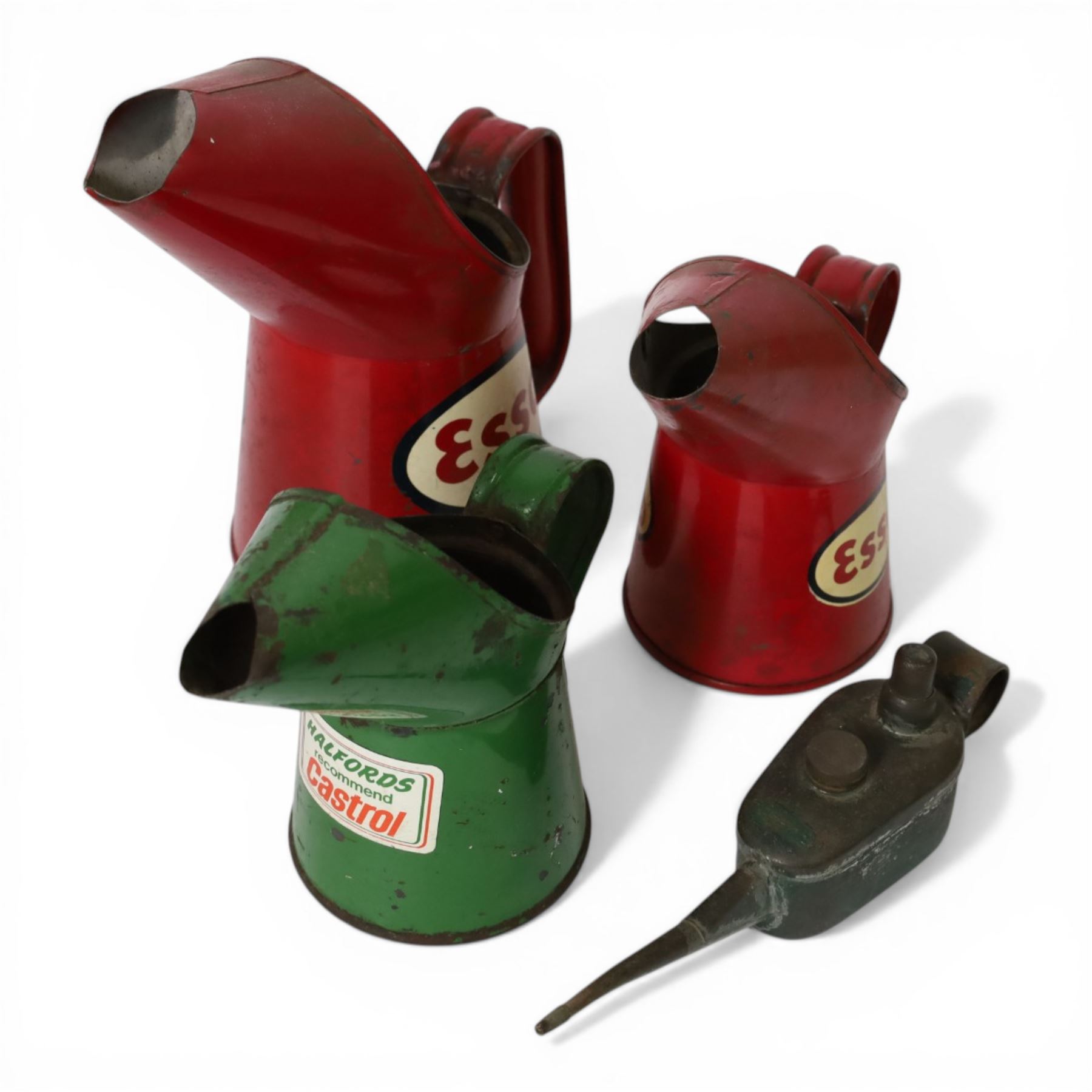 Shell-Mex Lamp Oil can, three oil jugs, including two red Esso examples and a green Castrol example and one other