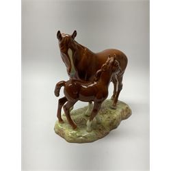 A Beswick model of a chestnut mare and foal on naturalistic base, 2nd version model no 953, with printed mark beneath, H19.5cm. 