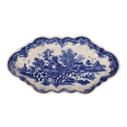 Worcester blue and white spoon tray, decorated in the Argument pattern, circa 1780-1785, L16cm, together with a Worcester blue and white bell shaped coffee cup with moulded scroll handle, decorated in the Man in the Pavilion pattern, circa 1760-1765, H6cm