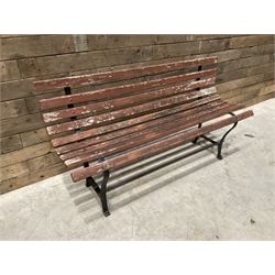 Wrought metal and wood slatted garden bench