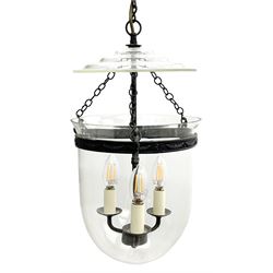 Vaughan Designs - Regency design bronzed metal and glass hall lantern, three branch light in glass bell, the band decorated with bell flower garlands and serpentine mythical beast chain brackets