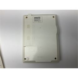 Three late 70s/early 80s handheld electronic games; Bandai Electronics Arcade ‘Gunfighter’ (1980), Grandstand ‘Invader From Space’ (1980), Palitoy ‘Merlin The Electronic Game Machine’ (1979) with game sheet and instruction booklet, all with original boxes (3) 