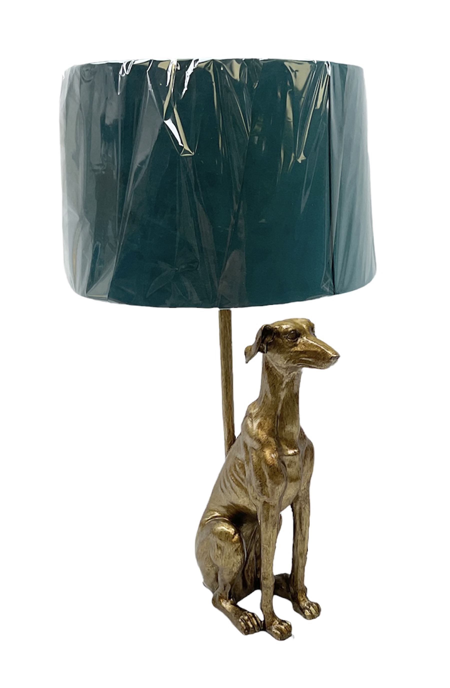 Composite table lamp, modelled as a gilt seated whippet, with teal velvet shade, H71cm
