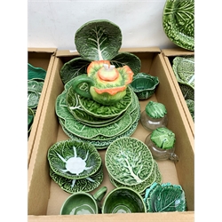 A large collection of various cabbage leaf wares, to include various bowls, dishes, plates, teapots, etc. (Qty). 