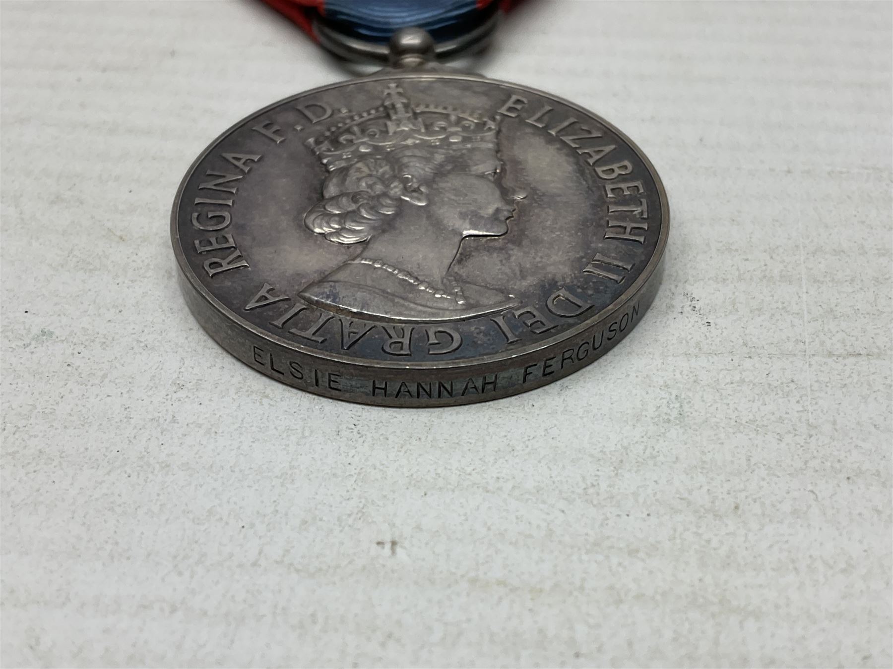 Two Imperial Service Medals to Elsie Hannah Ferguson and Fred Whitehead; each in original case; WWI Special Constabulary Medal to Inspr. Alfred W. Thompson; modern Prisoner of War Medal; cased; replica Victoria Cross and India Mutiny Medals with archive of information relating to Pte. Robert Newell V.C. 9th Lancers; replica Victoria Cross and George Cross with miniatures; and other replica medals etc