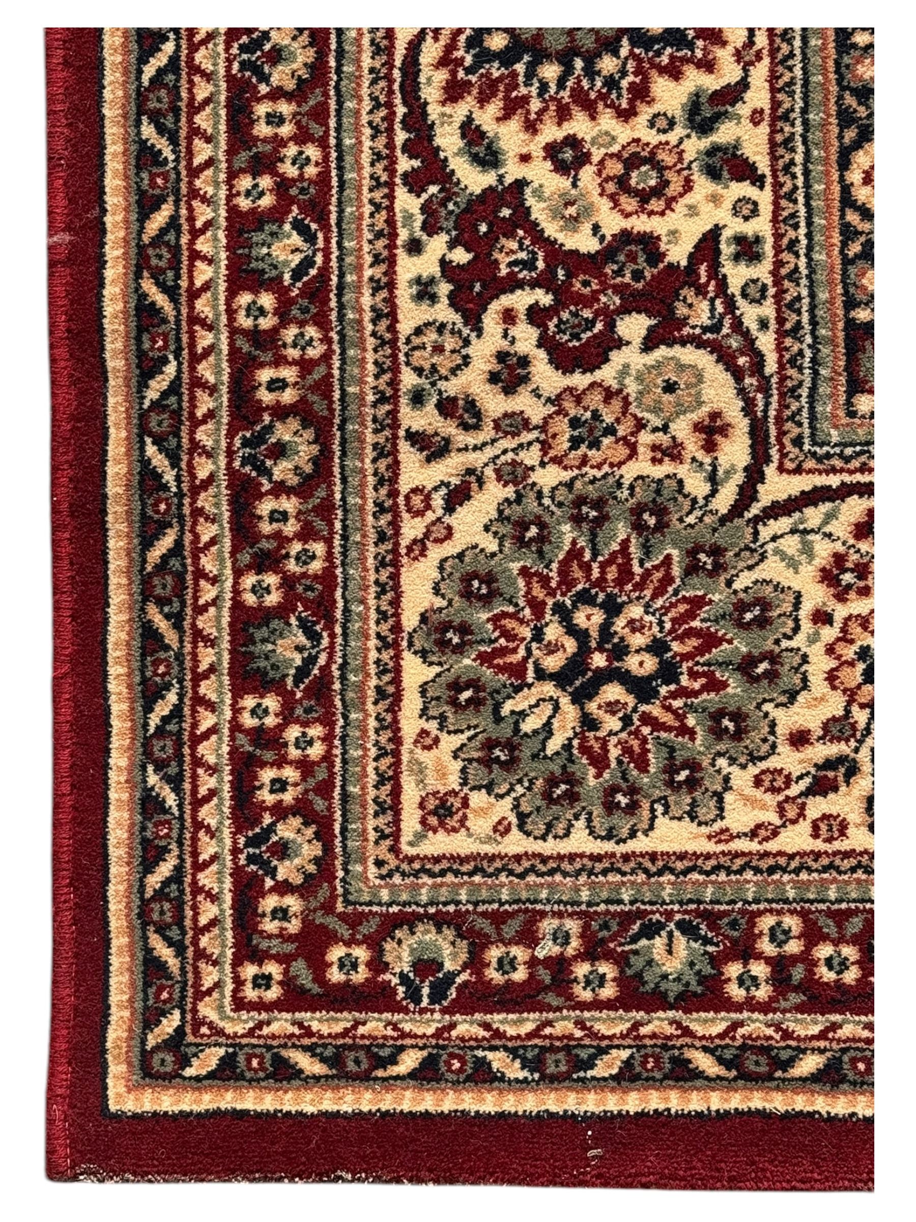 Royal Kashmir worsted wool modern Persian design area rug, with crimson field and stylised rosette patterning throughout, surrounded by wide multi-band border incorporating cartouche and lotus flower motifs