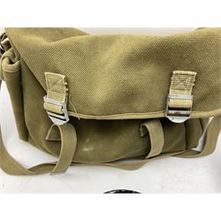 Fishing tackle, including 'The Gnat' fly reel, Alvey 4 1/2 inch reel, Paramount 4 1/2 inch reel, other fishing reels, various fishing flies and other similar items in a carry bag 