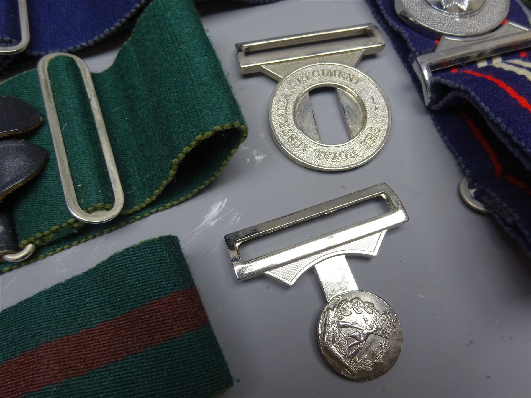 Seven Military Stable Belts with Regimental buckles The Corps of Royal