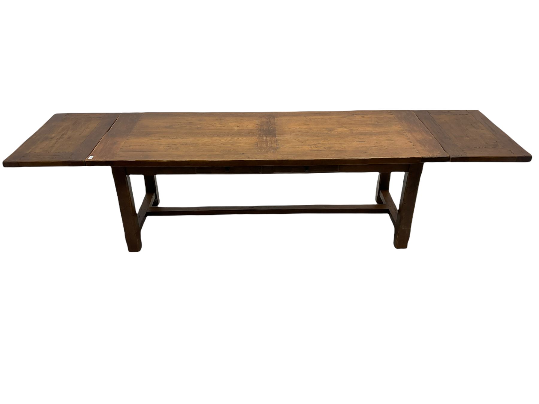 Antix French oak dining table with two leaves, two frieze drawers;, and six ladder back chairs with rush seats