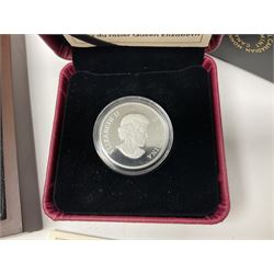 Royal Canadian Mint 2019 'Queen Elizabeth Rose Blossoms' three dollar fine silver coin cased with certificate, 2012 and 2013 'Christmas Silver Coin Pair' twenty dollars fine silver coins in a case with certificate and a 2011 twenty dollars fine silver coin with certificate 