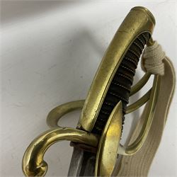 19th century French Chasseur a Cheval de la Guard trooper's sword with 86.5cm slightly curving fullered blade, brass three-bar hilt with elongated elliptical langets and wire-bound leather grip; in polished steel scabbard with two brass suspension rings L104cm overall