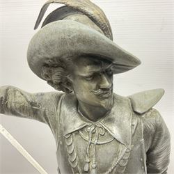 Spelter figure modeled as Cavalier with a raised sword, upon a circular base, H52cm