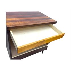 Troeds of Sweden - mid-20th century rosewood veneered cupboard, single door with brass handle enclosing interior fitted with one drawer, raised on ebonised tapered and splayed supports