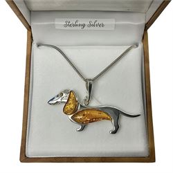 Silver Baltic amber dachshund pendant necklace, stamped 925, boxed 