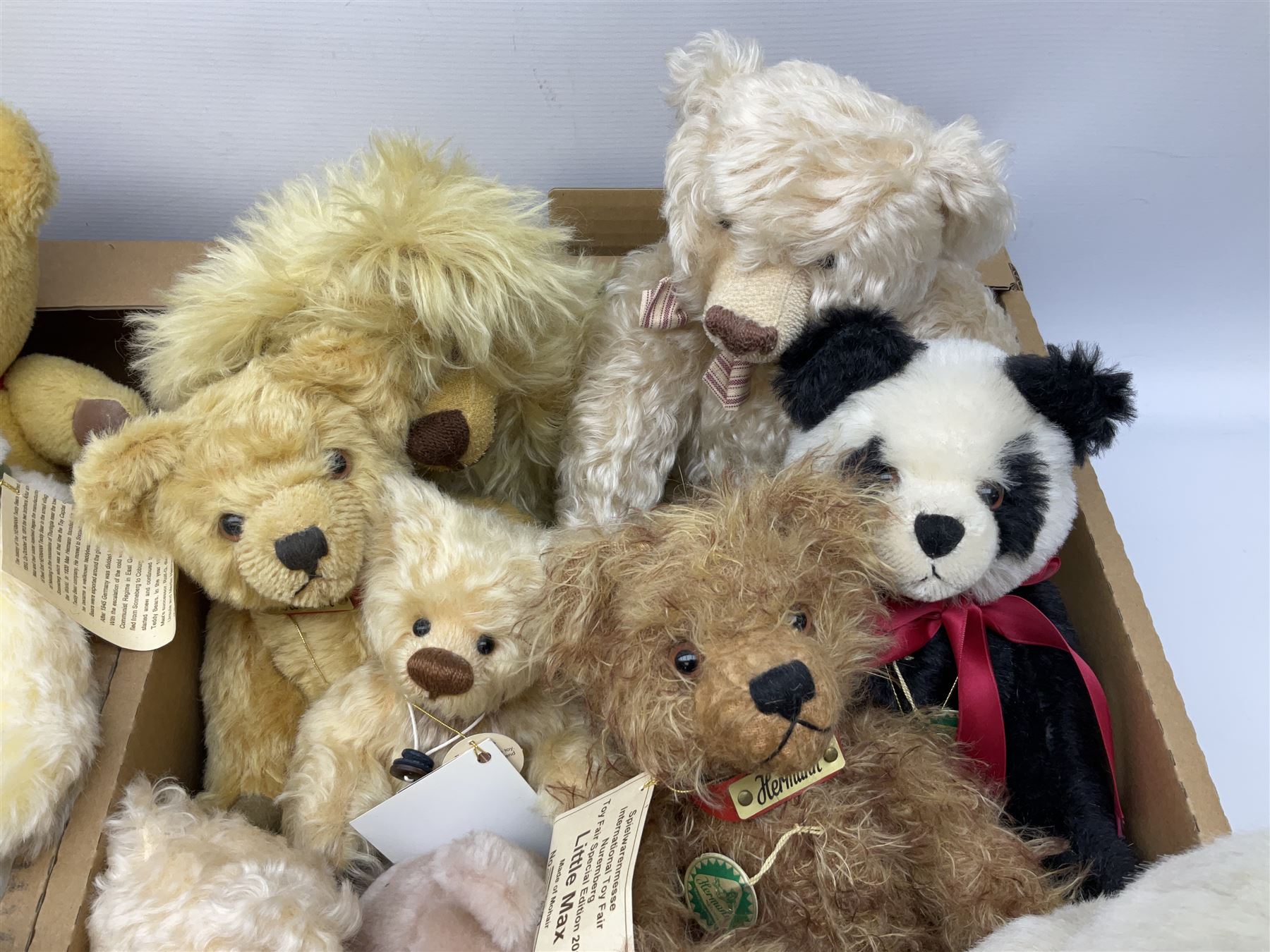 Quantity of teddy bears, predominantly Hermann examples, to include limited edition examples, Little Hilde, Classic Panda Bear, A Handful of Joy, etc, together with Merrythought bear, Martin Germany bears, bear with growler etc in two boxes
