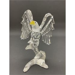 Swarovski Crystal animals, comprising white peacock, the tail with cascading blue flowers, perched eagle with yellow beak, ibex with frosted crystal horns and unicorn with frosted crystal horn, tallest H13cm