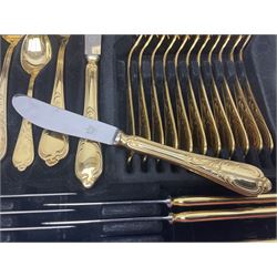 Bestecke Solingen canteen of gold plated cutlery for twelve place settings, including ladle, cake slice and serving spoons, contained within a briefcase, together with a matching set twelve of Bestecke Solingen gold plated fish knives and forks, in fitted case 