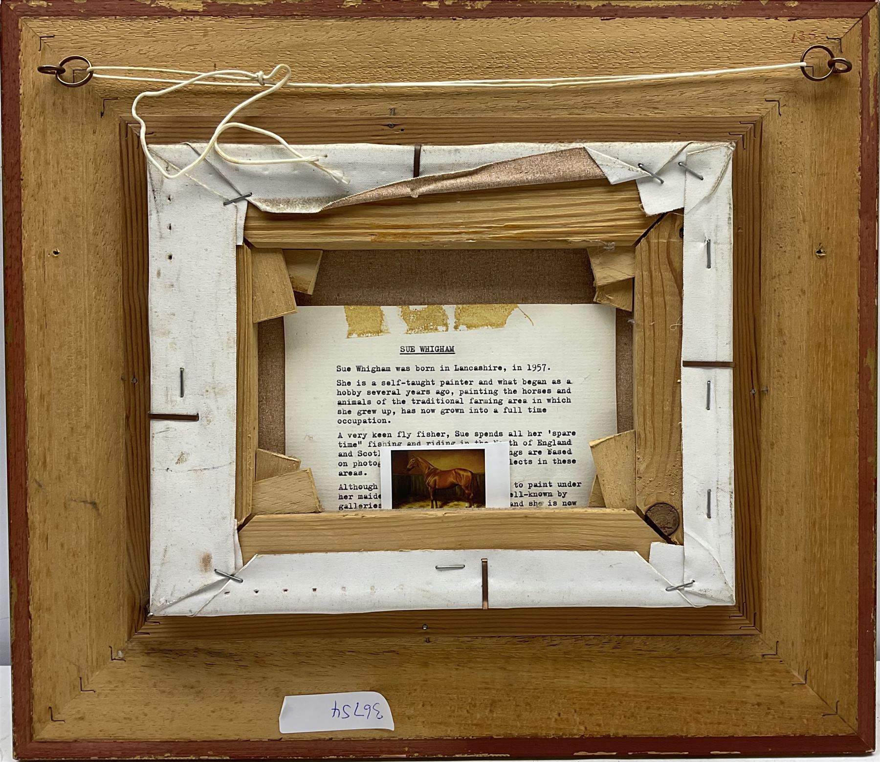 Sue Whigham (British 1957-): Bay Horse in Stable Interior, oil on canvas signed 7.5cm x 23.5cm