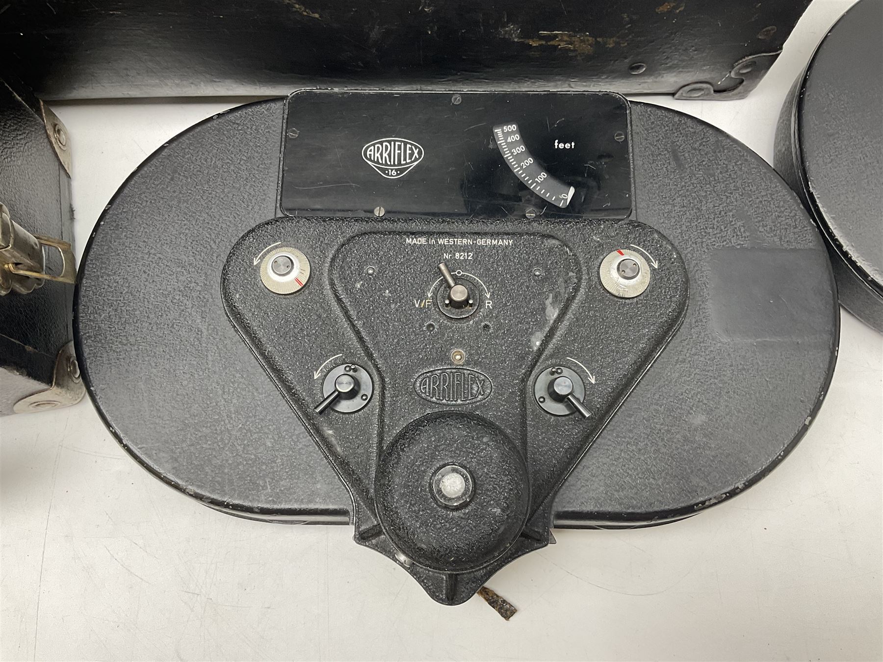 Arriflex 16 camera body, serial no. 11250, three 400ft magazines, cased filter set, 'Angenieux-Zoom Type 4x17.5B F.17.5-70mm' lens, serial no. 1199886 cases and other Addiflex equipment in hard case 