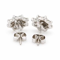 Pair of 18ct white gold diamond flower head earrings, each stud set with nine round brilliant cut diamonds, Birmingham 1996, total diamond weight approx 1.20 carat