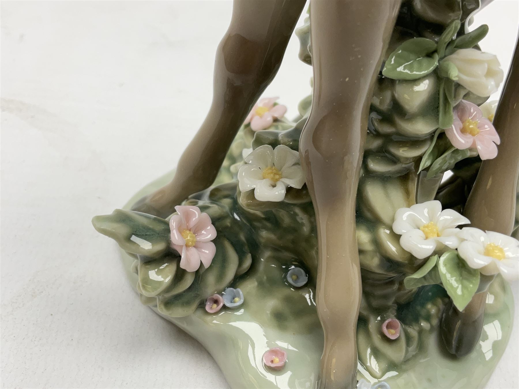 Two Lladro deer figures, comprising A Fawn and Friend no 5674 and Hi There no 5672, both with original boxes, largest example H14.5cm