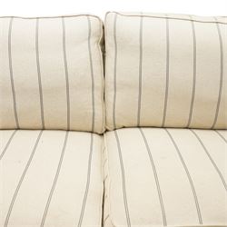 20th century Howard shape two seat sofa, deep seat sofa in cream and grep striped upholstery, raised on dark supports terminating in front castors 
