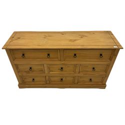 Pine chest fitted with eight drawers, black iron handles