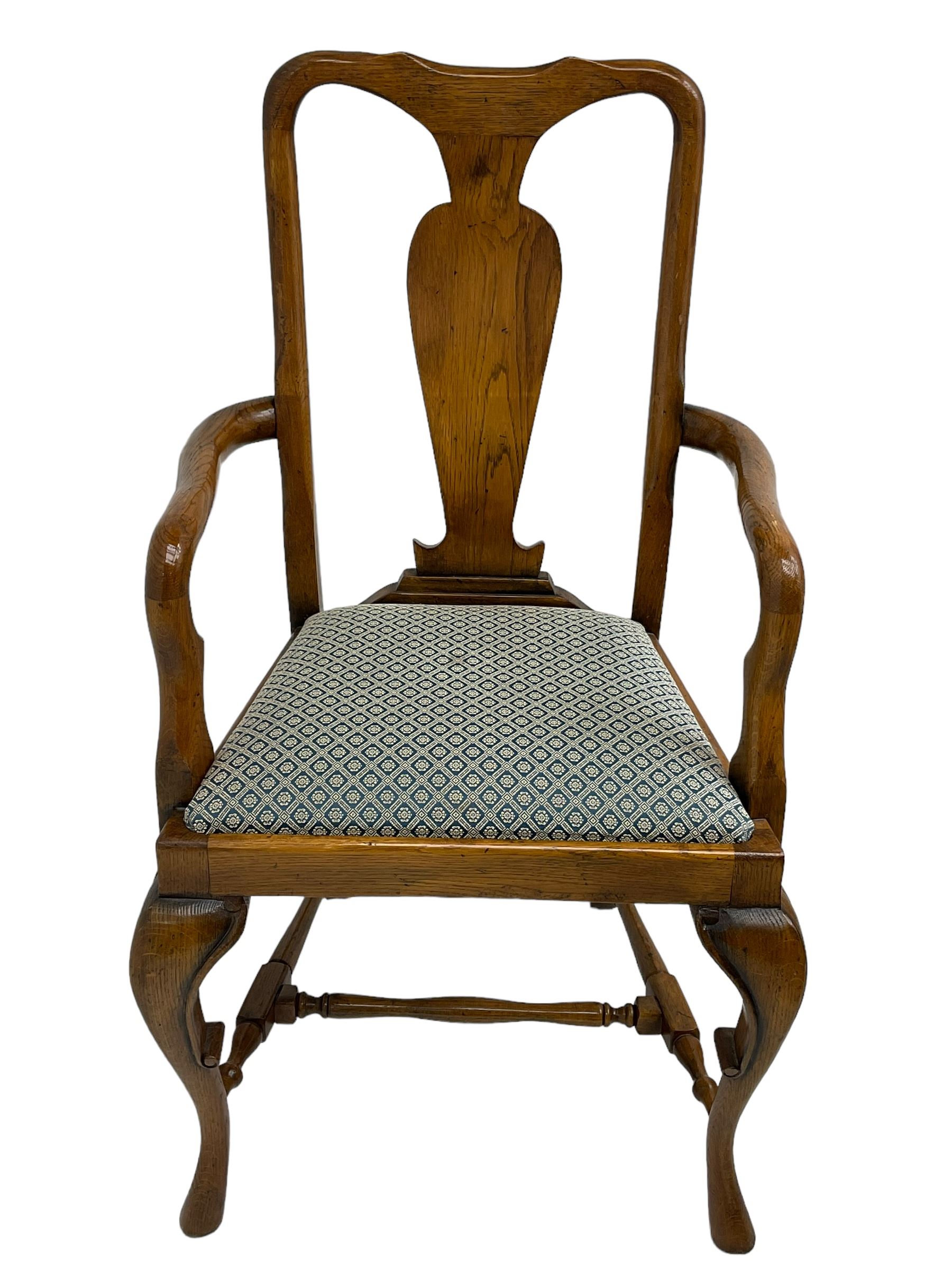 Late 20th century oak dining table, rectangular top with two draw leaf extensions, on turned supports united by moulded hayrake stretchers (180cm - 278cm x 90cm, H76cm); set of eight (6+2) oak dining chairs, shaped cresting rail over shaped splat back, upholster drop-in seat, on cabriole supports united by turned H-shaped stretchers 